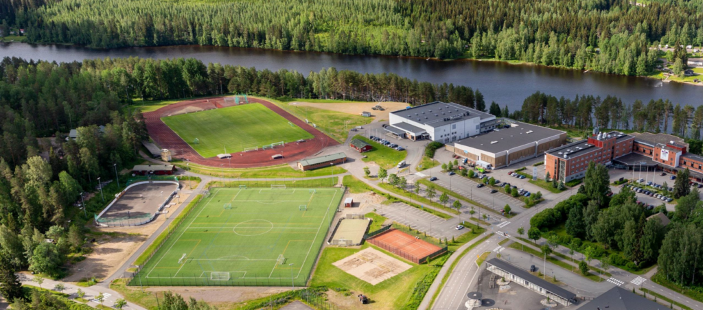 Ilmakuvaa rakennuksista ja urheilukentistä